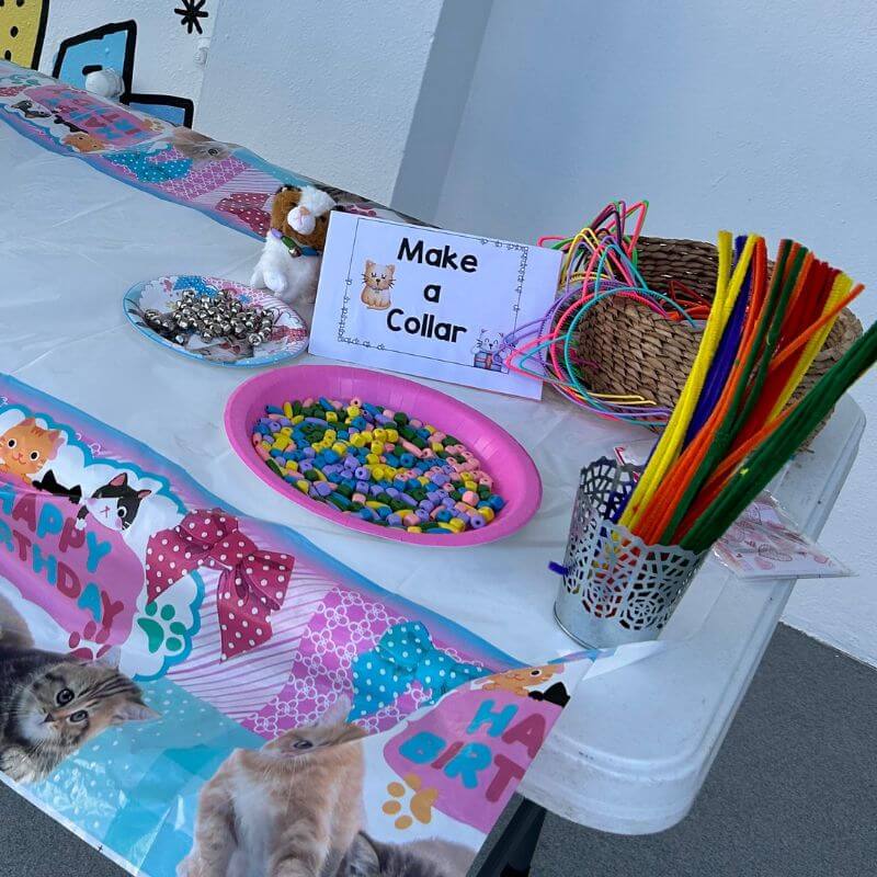 "Make a Collar" station for a cat themed birthday party