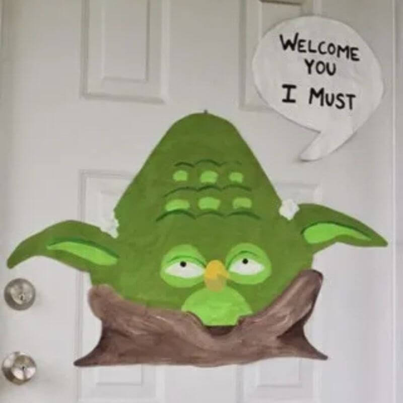 yoda cutout and sign that says "welcome you i must"