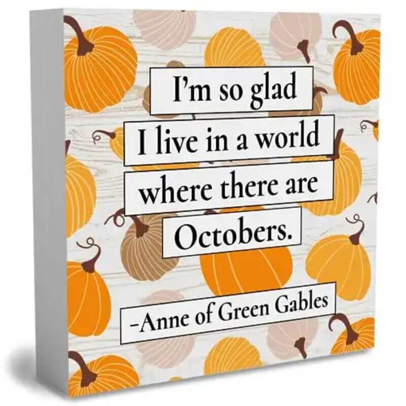 "I'm so glad I live in a world where there are Octobers" sign